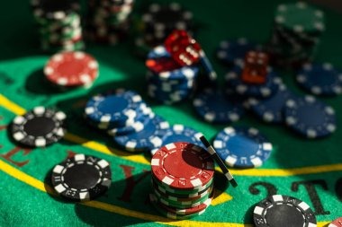 Caribbean Stud Poker table layout showing dealer position, player cards, and betting areas
